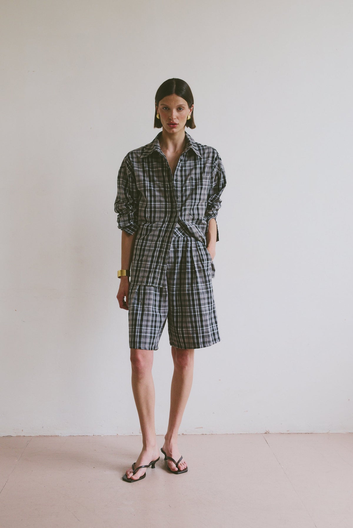 Checkered outfit with shorts and a shirt