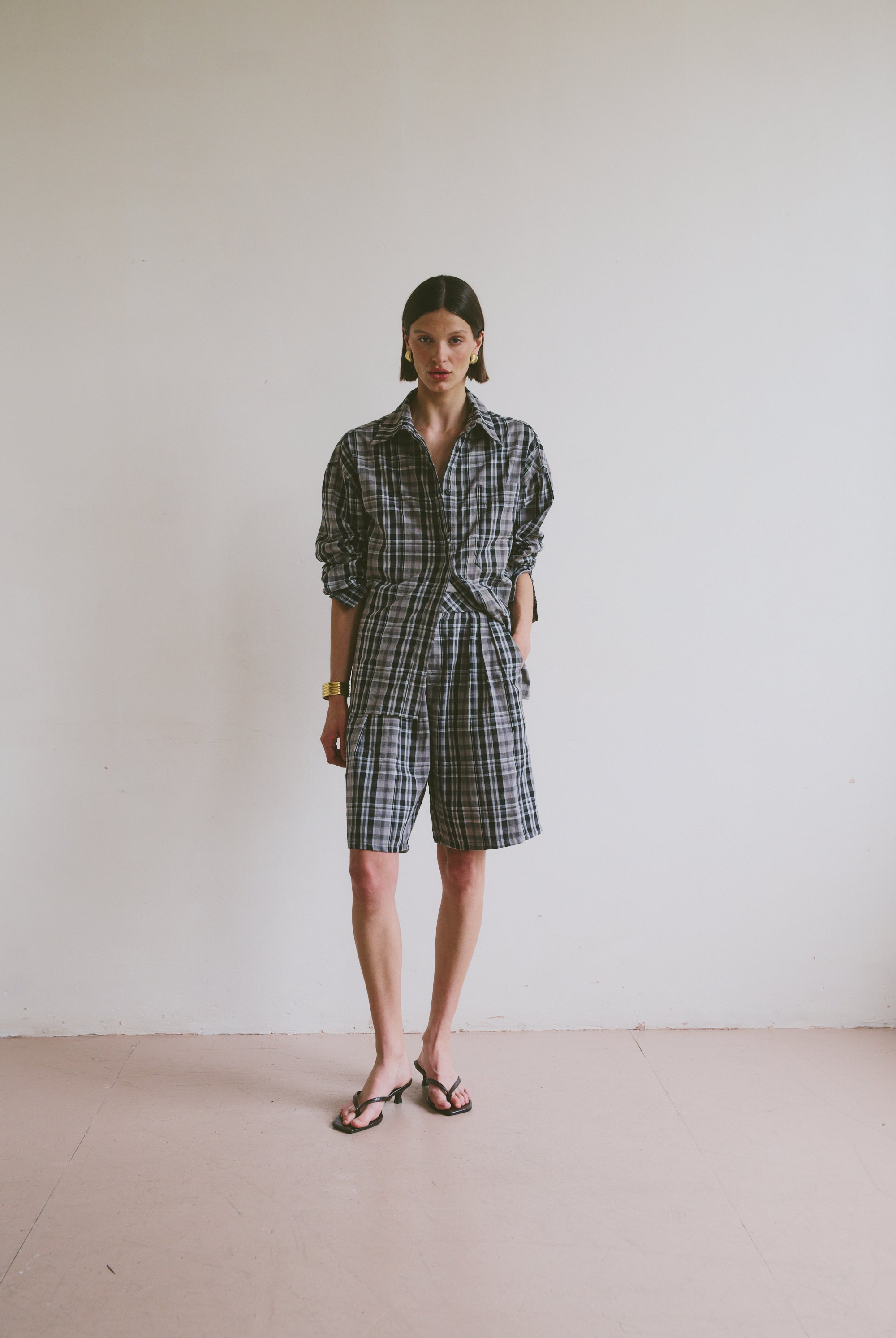 Checkered outfit with shorts and a shirt