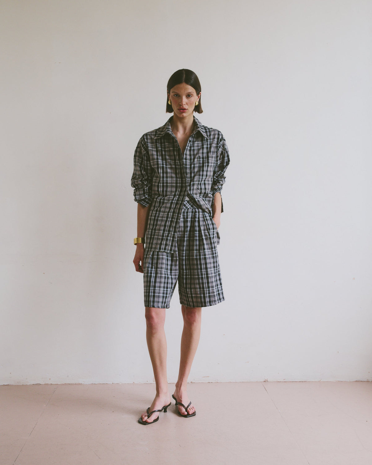 Checkered outfit with shorts and a shirt
