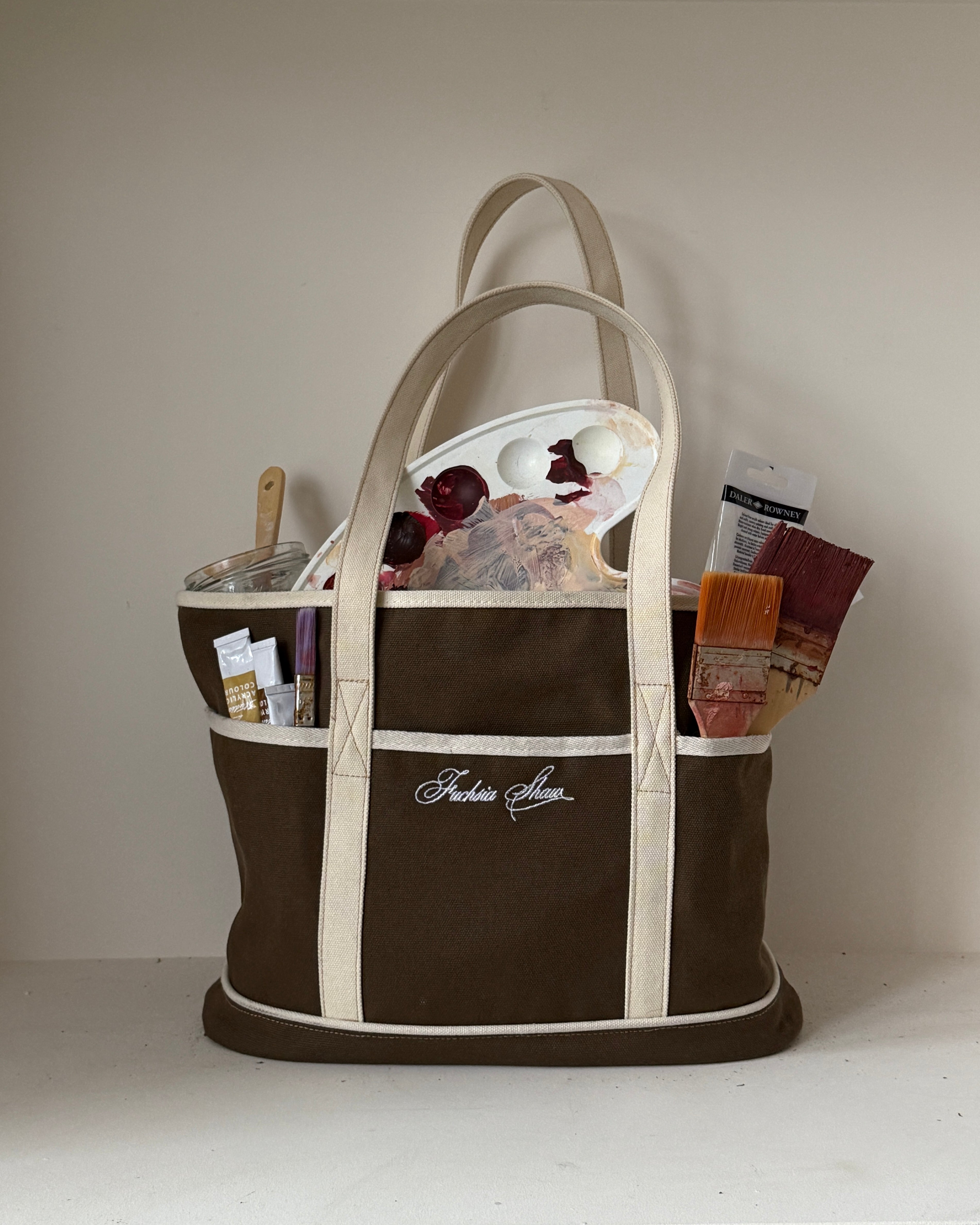 Tote bag full of painting tools 